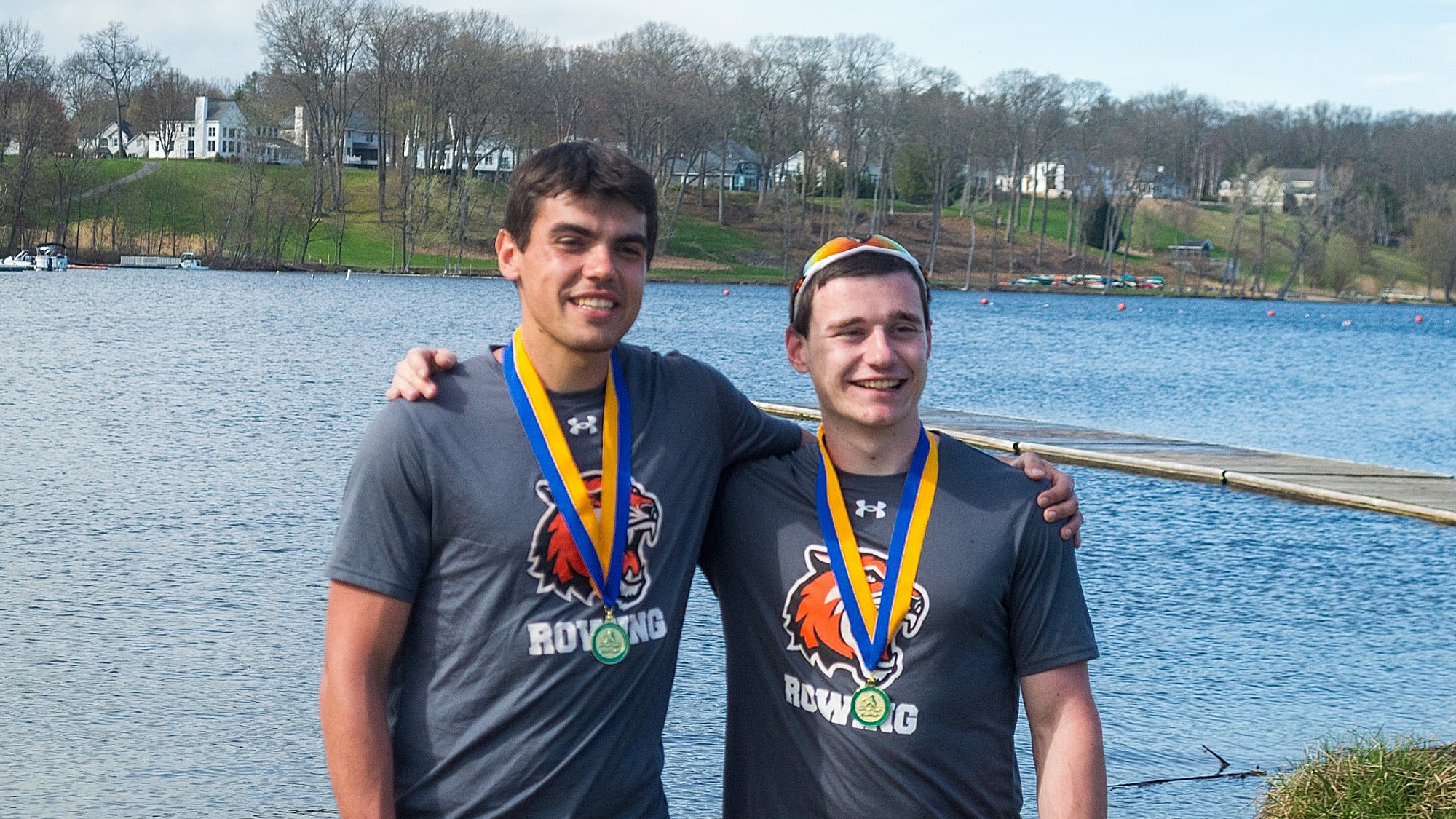 a pair of RIT men's rowers pose for a picture wearing medals after winning a race at the NYS Collegiate Championships on Saturday, April 18, 2026 in Saratoga Springs, N.Y.