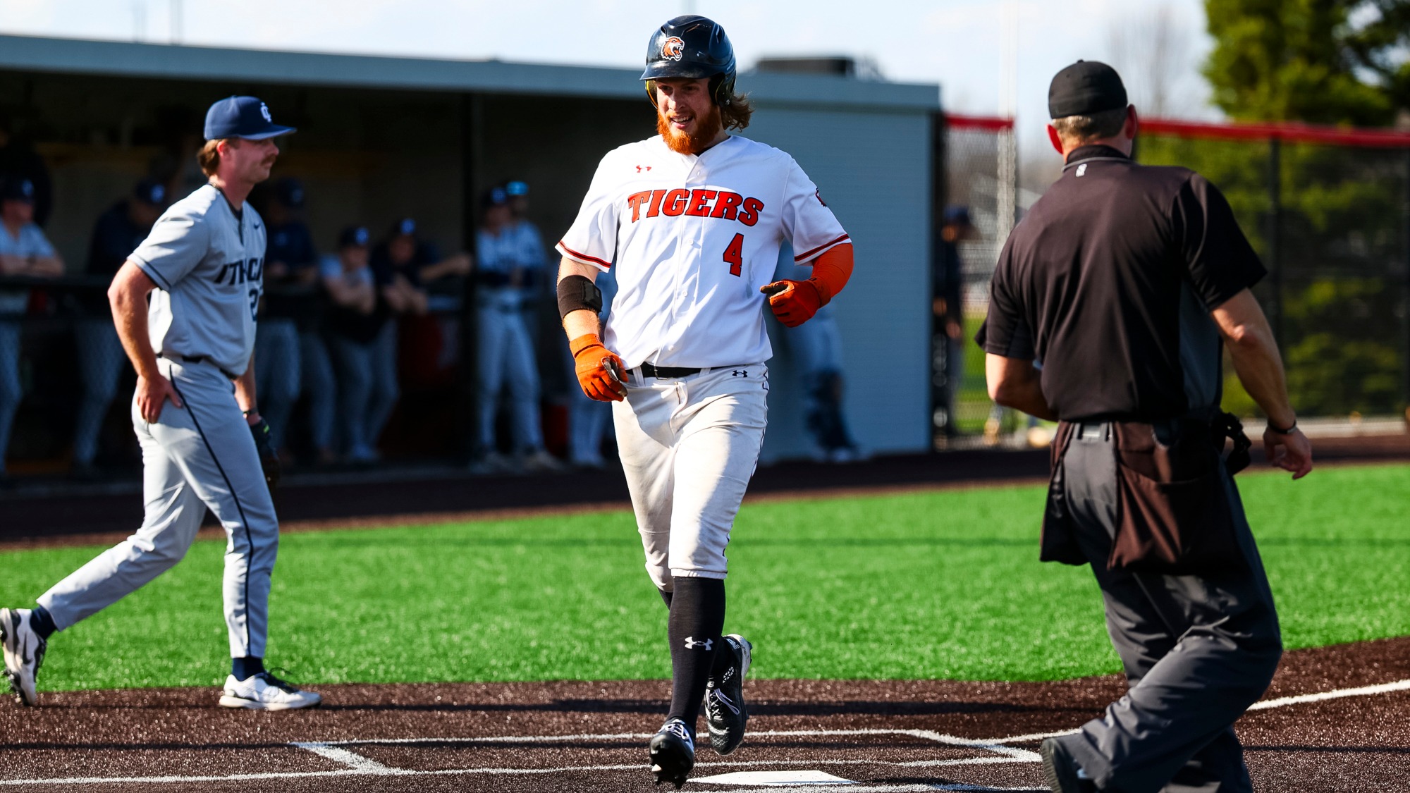 A runner scores for Rochester Institute of Technology in a baseball game against Ithaca on Friday, April 3, 2026