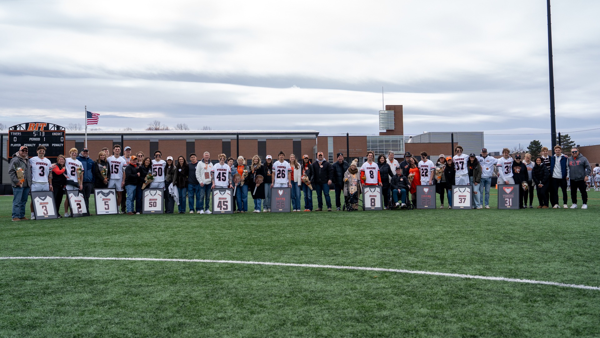A group shot of the 10 RIT seniors with their families