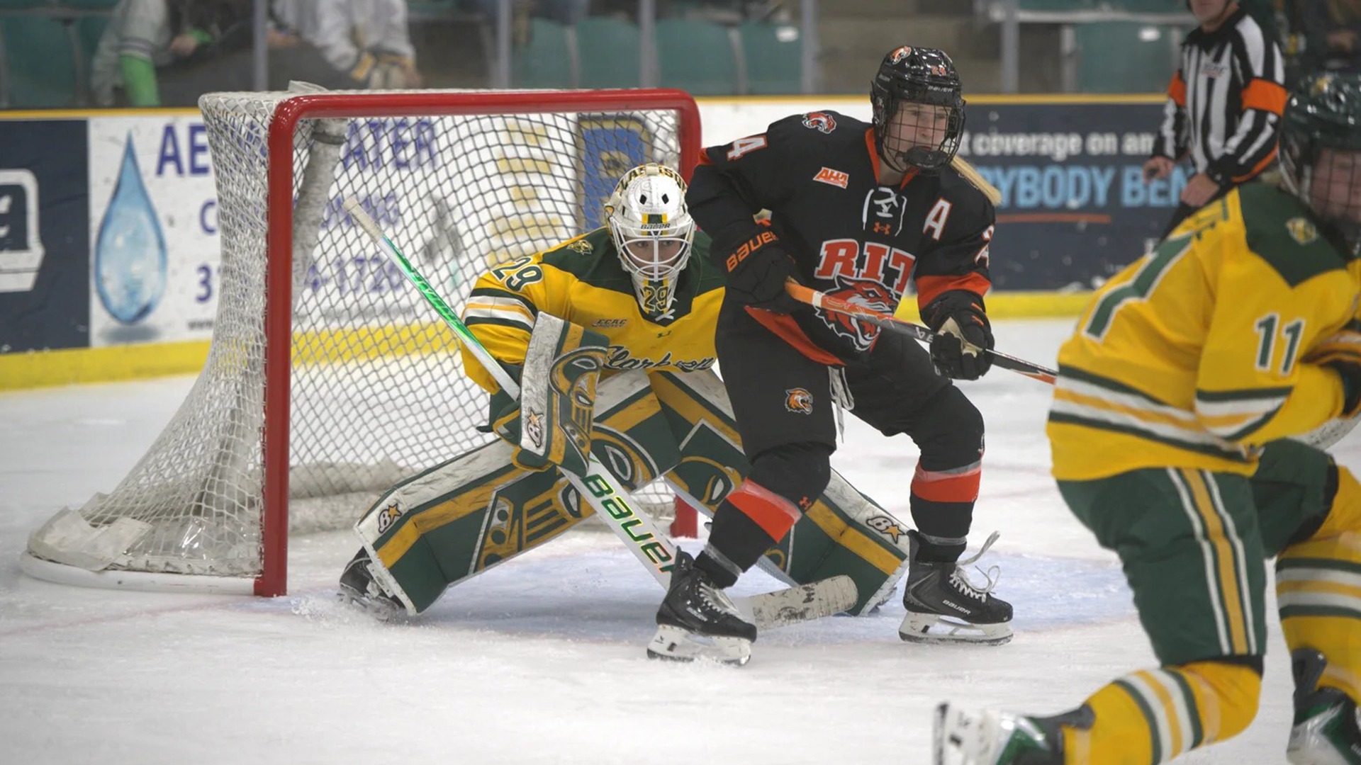RIT's Linda Rulle blocks Clarkson's goalie on September 26