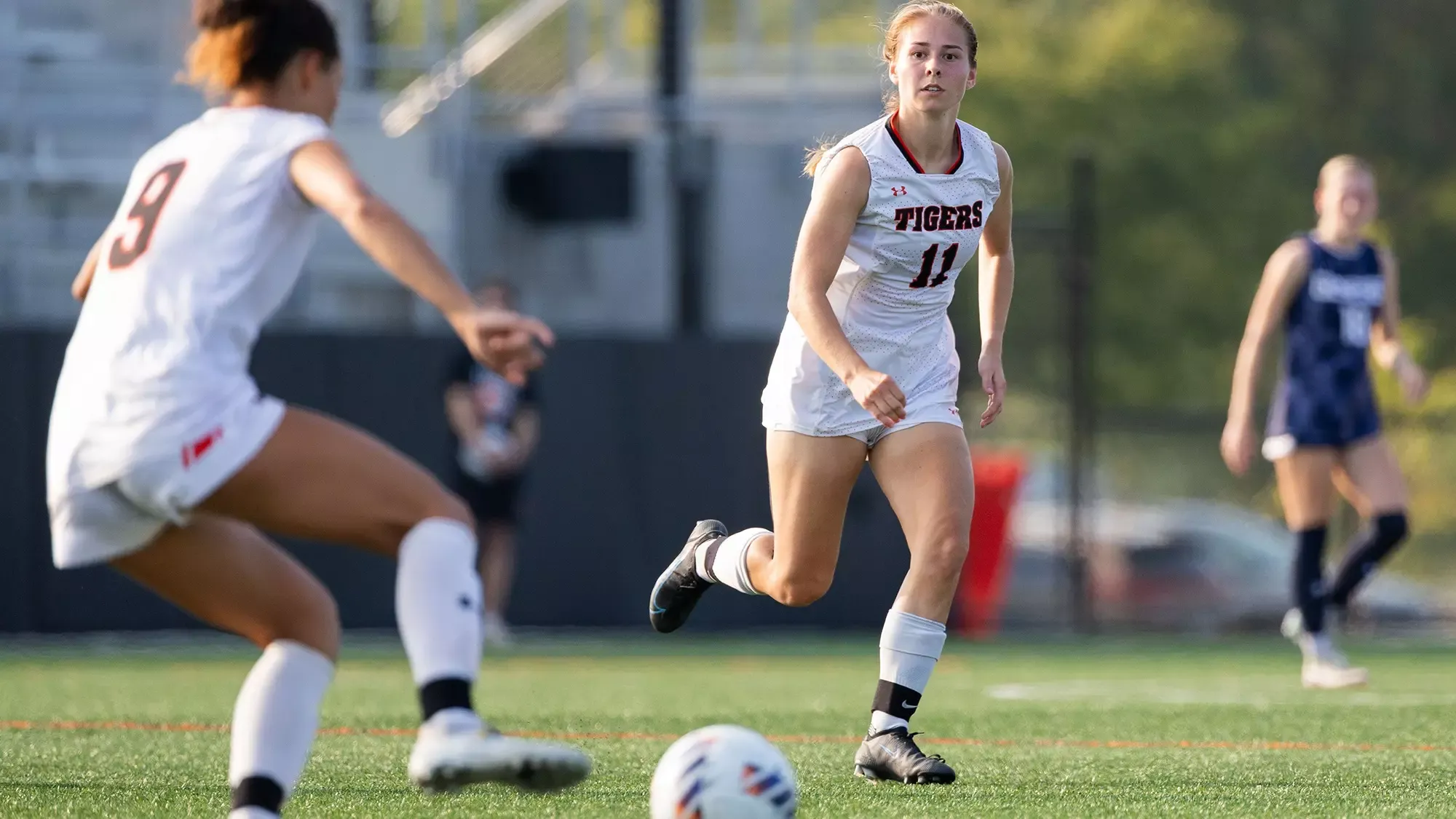 RIT's Emma Pedro, #11, sending a perfect pass to her teammate on Tuesday, Sept. 1, 2026, at Thomas Fearey Judson Jr. Stadium. RIT Athletics / Ayden Acebo.