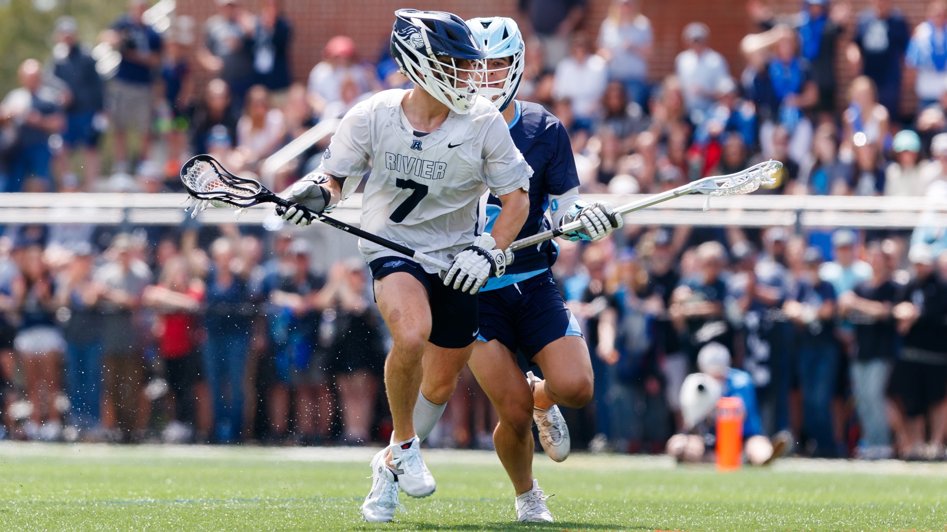 Joe O'Reilly escapes pressure from opposing player