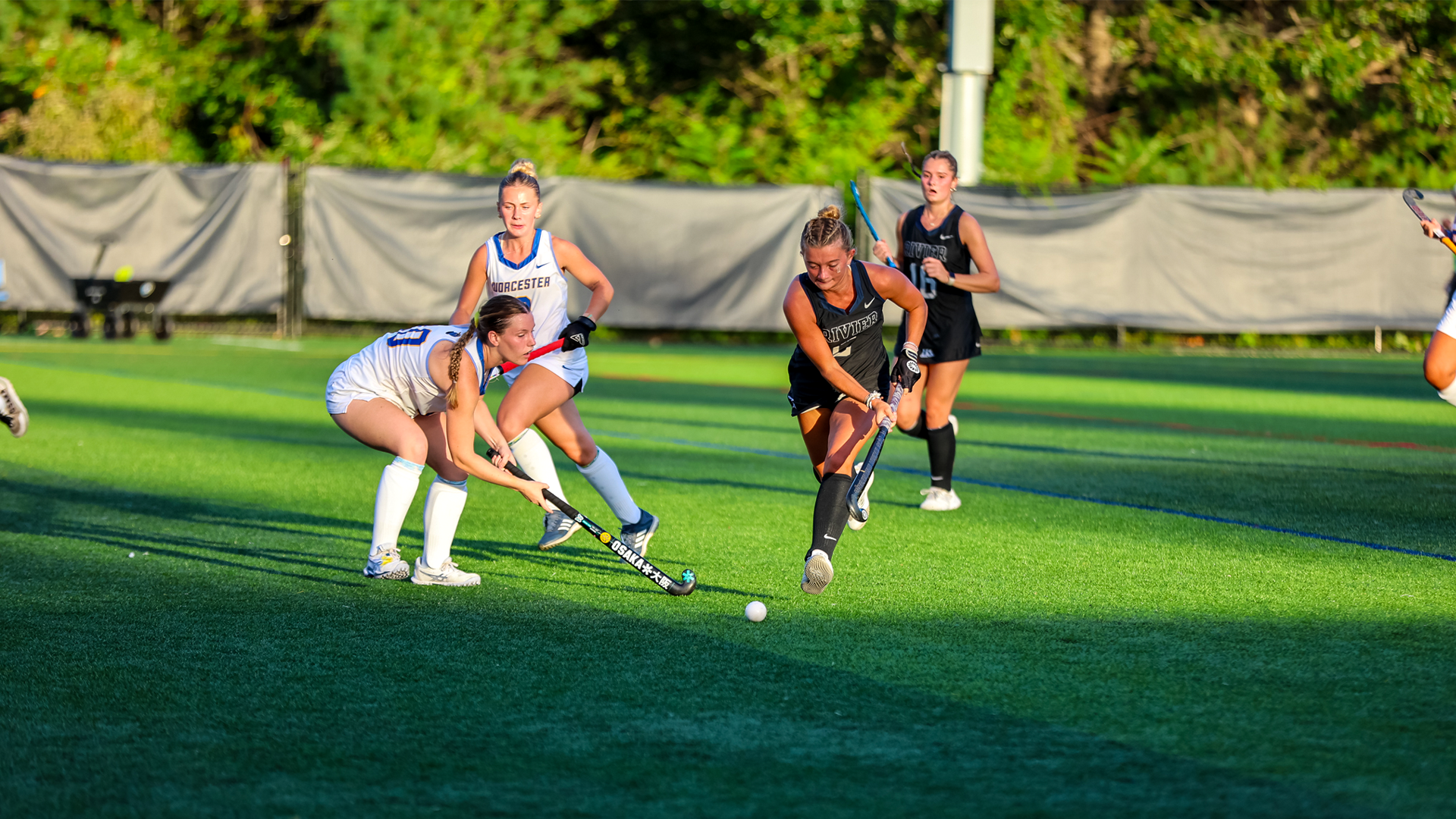 Camdyn Despres running past defender 