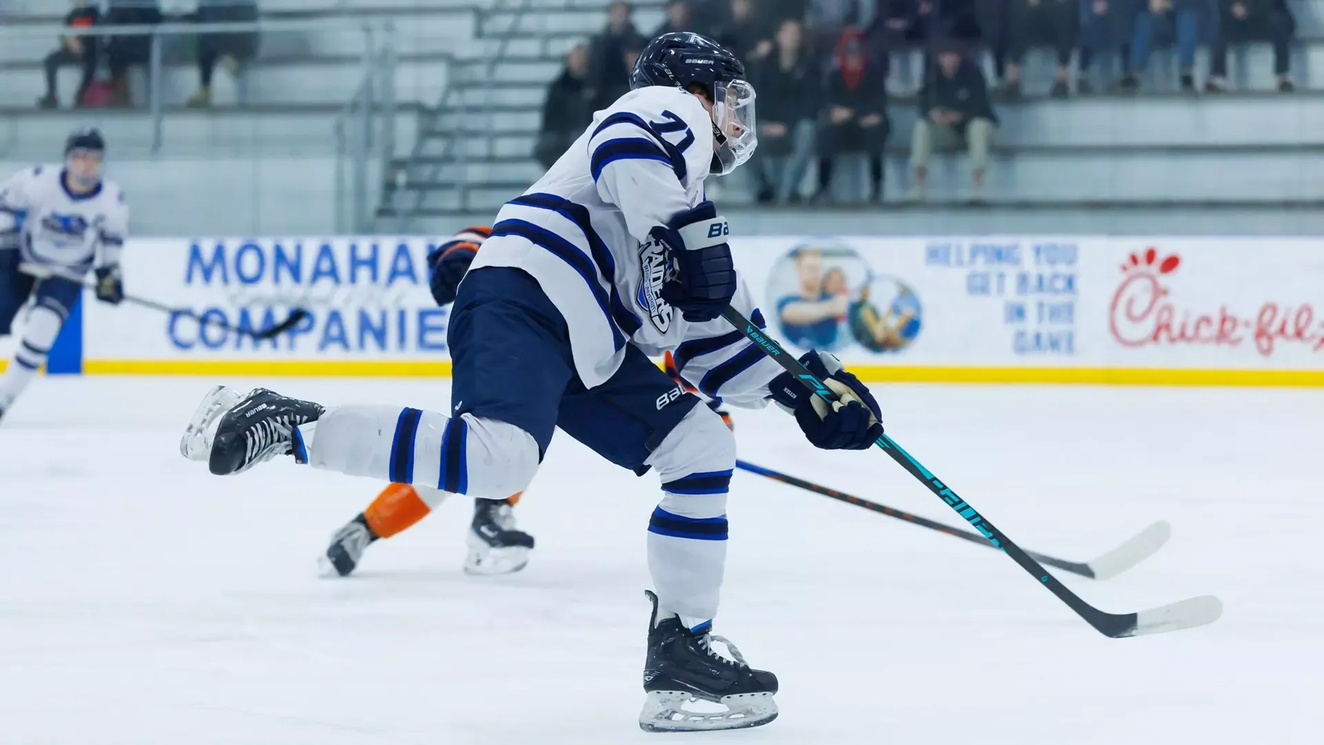 Payton Kender Shooting the Puck
