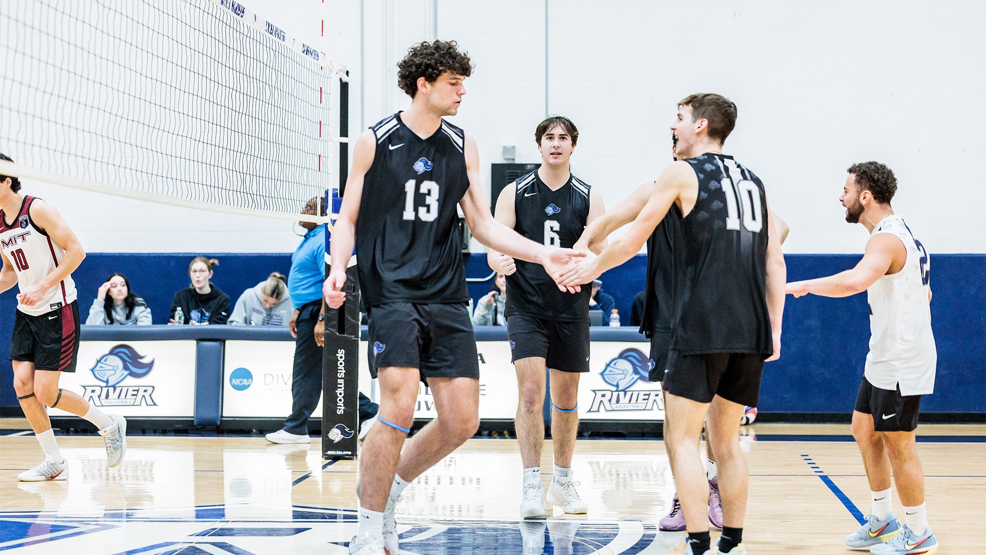 Tyler Dickinson and Cade Barron High Fiving 