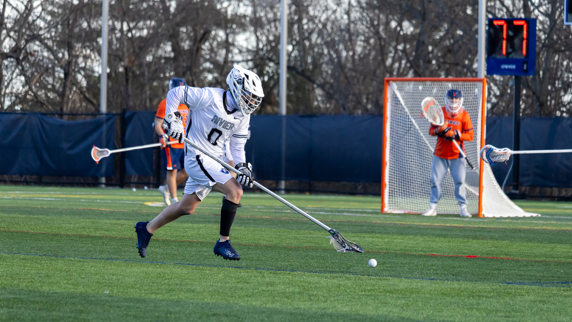 Colin Foley scooping a ground ball