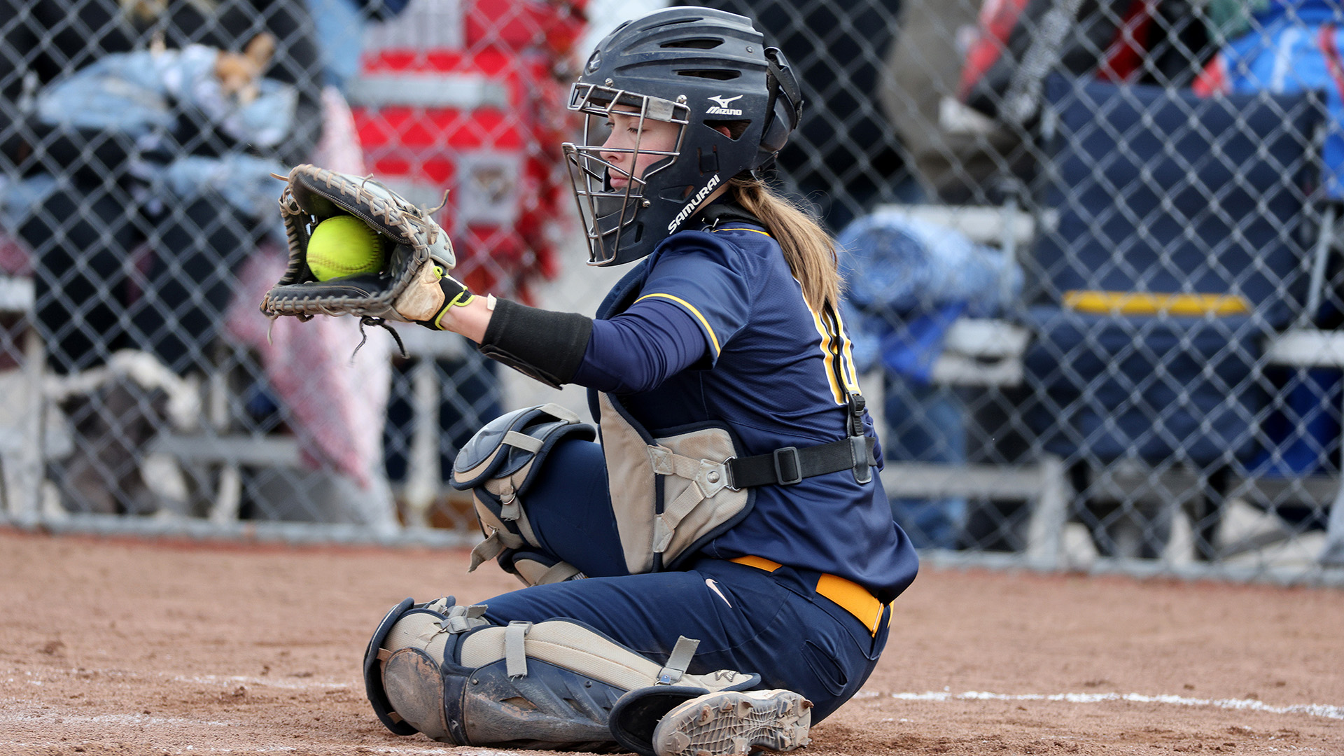 Softball Catchers In Action