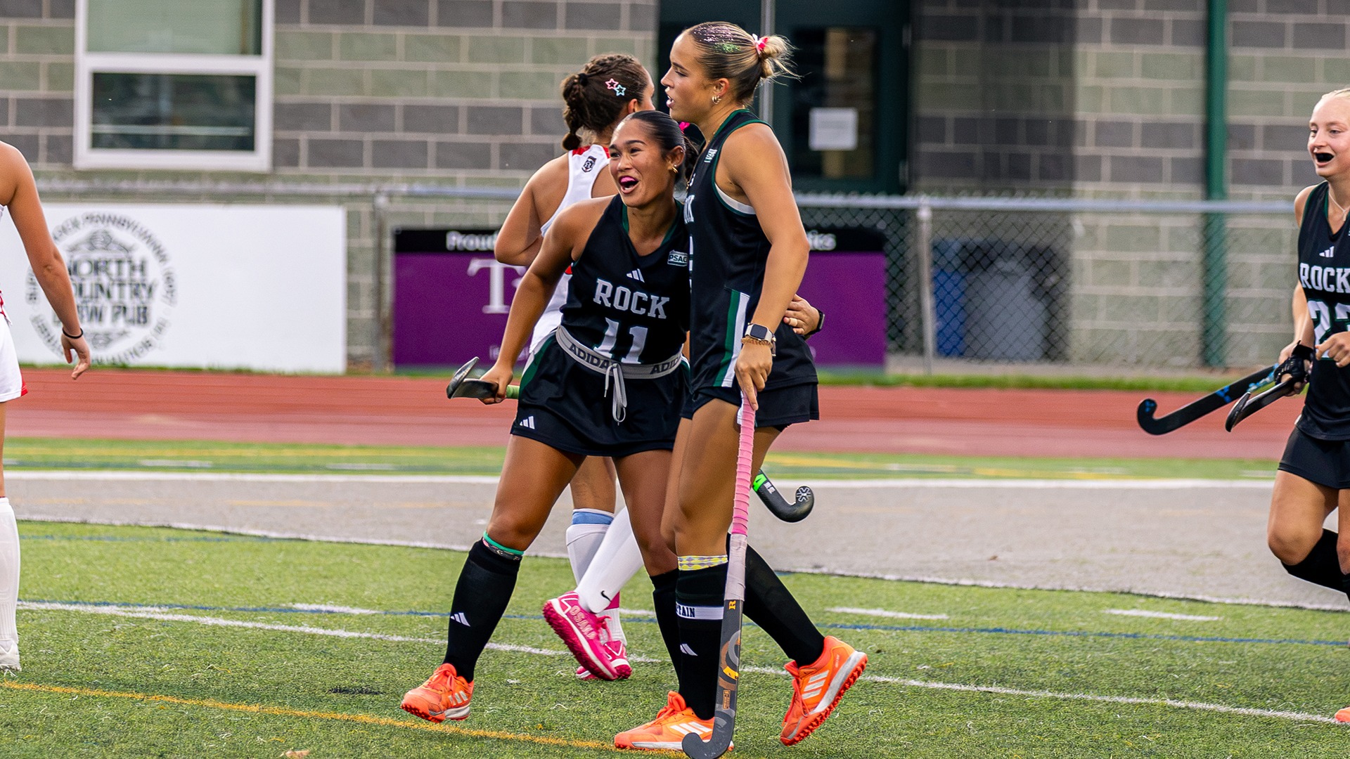 Lucy Hutchinson and Coral Piramo Goal Celebration vs. D'Youville