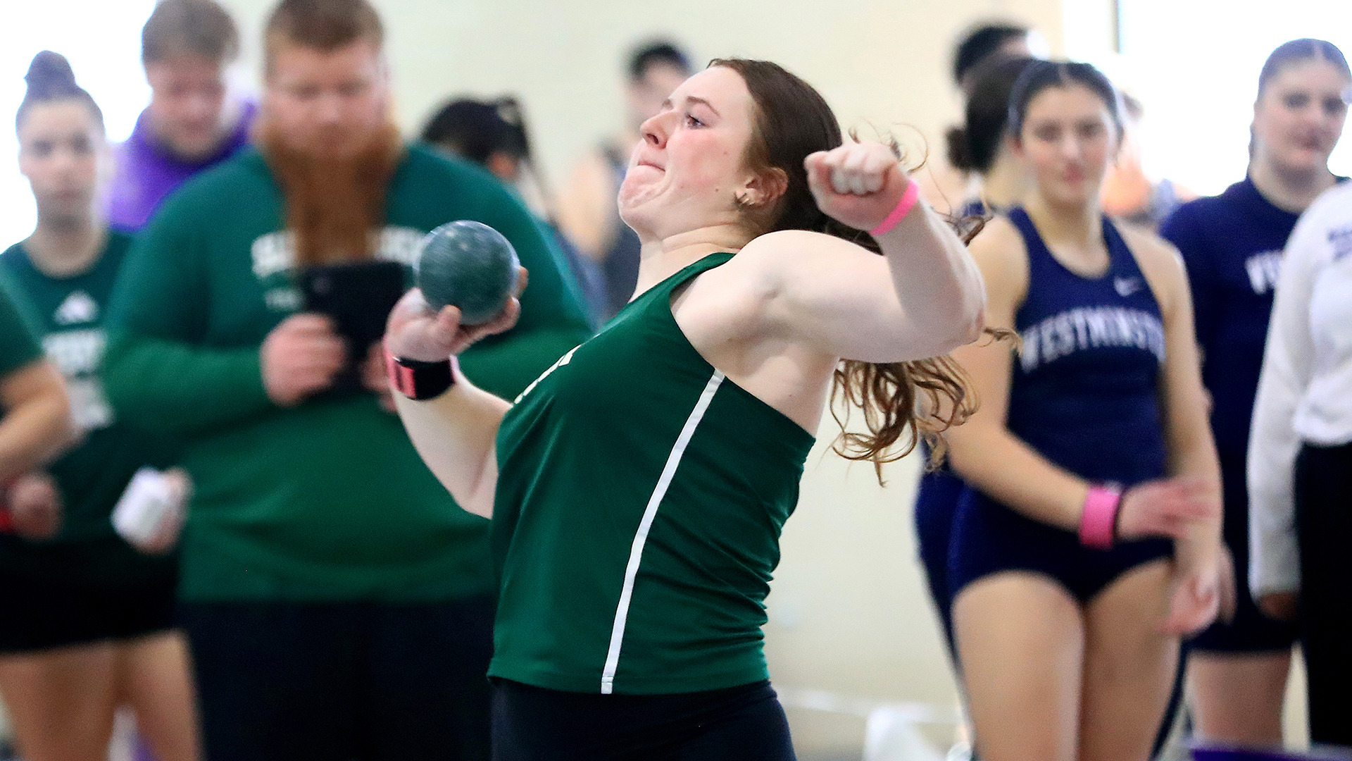 Olivia Heckman throws the shot put
