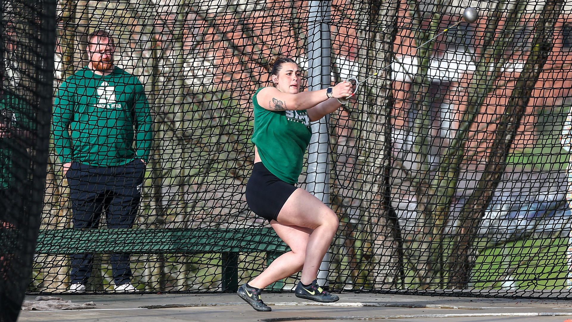 Savannah Schneck throws hammer at SRU meet