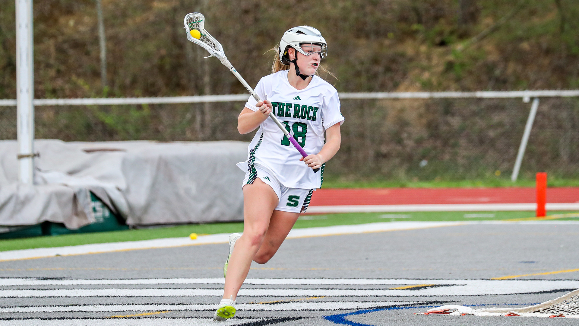 Lauren Petty cradles in a game against Edinboro