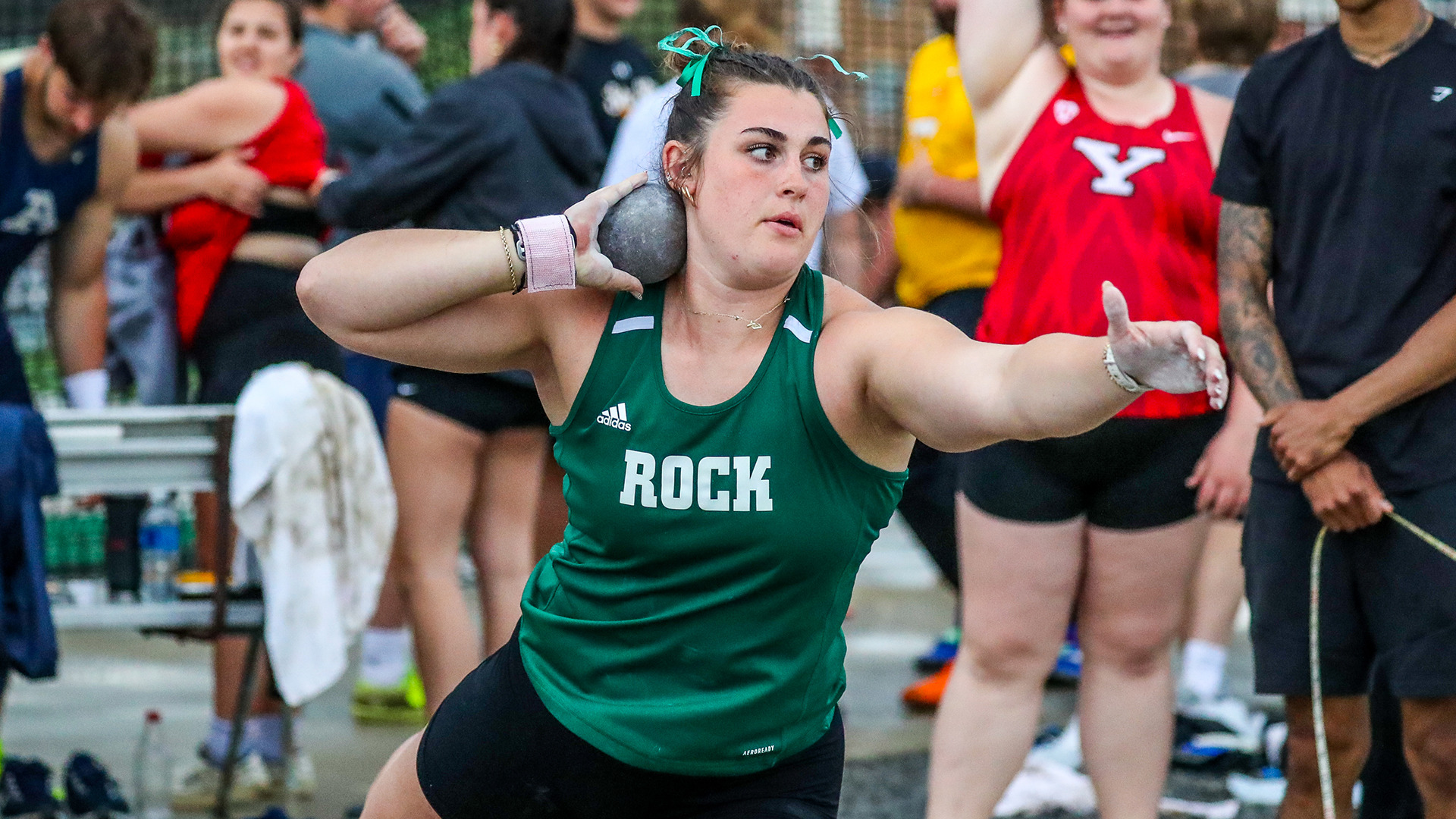 Savannah Schneck throwing shot put