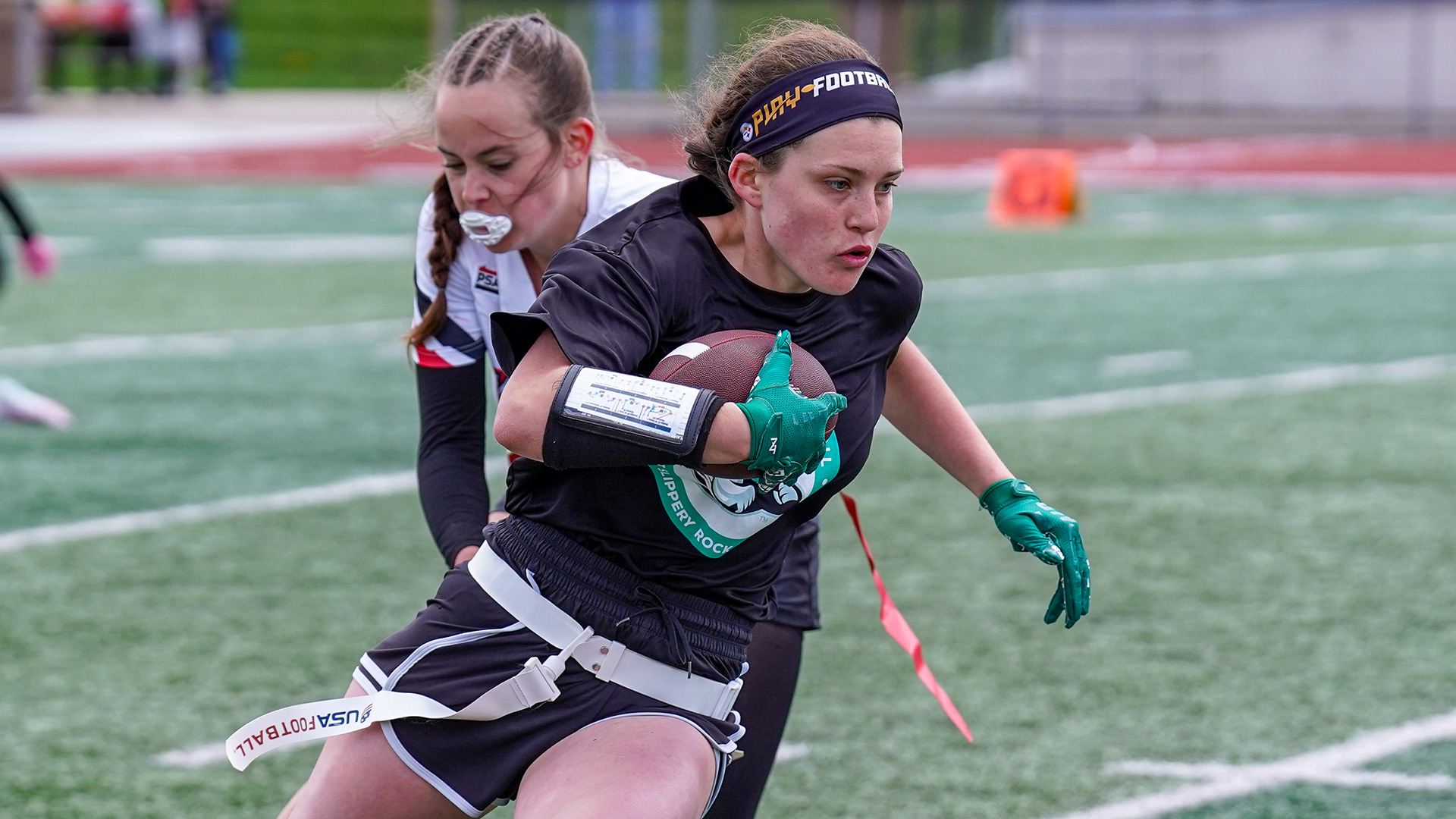 Courtney Yoder carries the ball in a flag football game at Cal in 2026