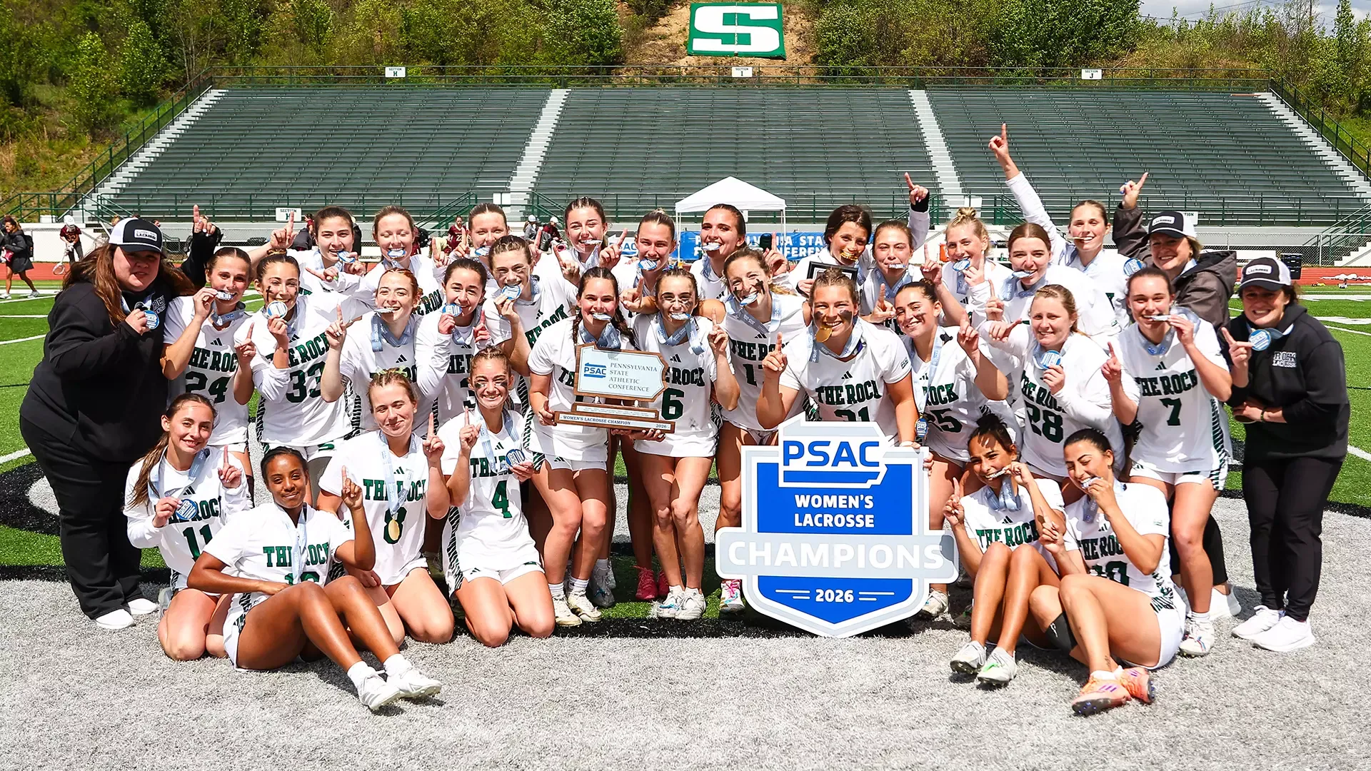 Slippery Rock celebrates winning the 2026 PSAC Championship following tournament victory over Kutztown on May 3, 2026