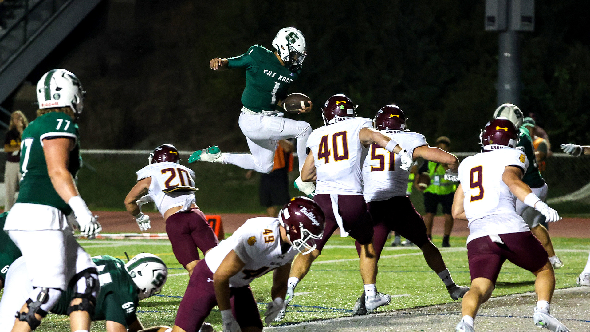 DaOne Owens leaps into the end zone for the game-winning play against No. 12 Minnesota Duluth