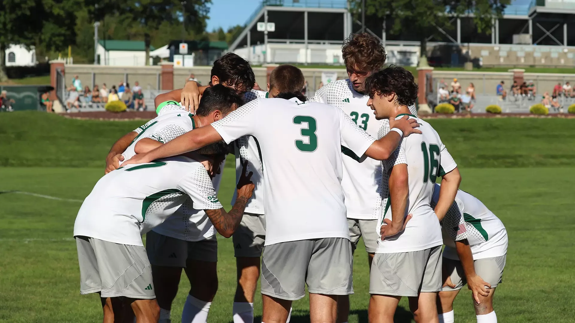 Slippery Rock team huddle vs. District of Columbia