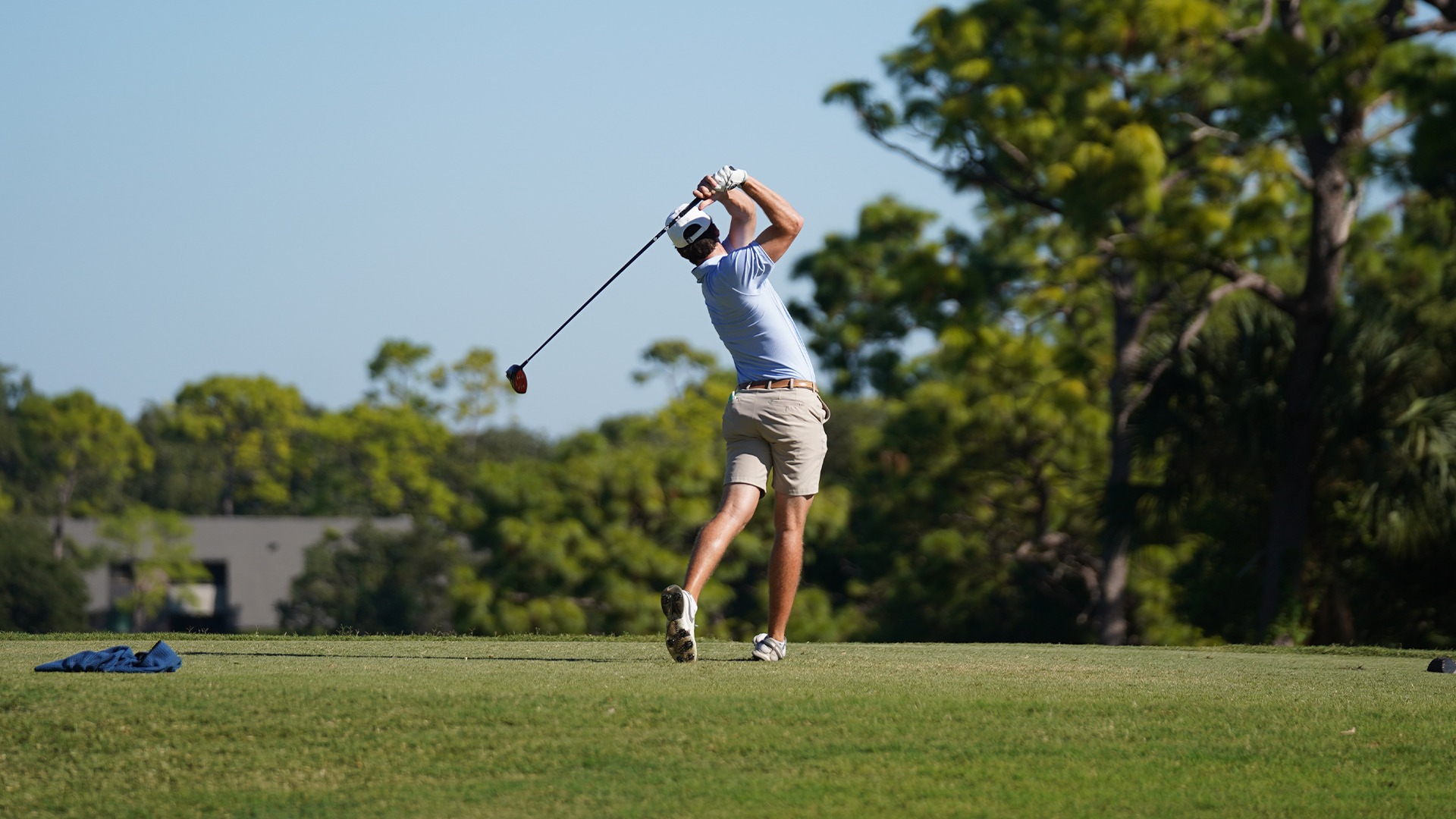 Andrew clark teeing off, back view
