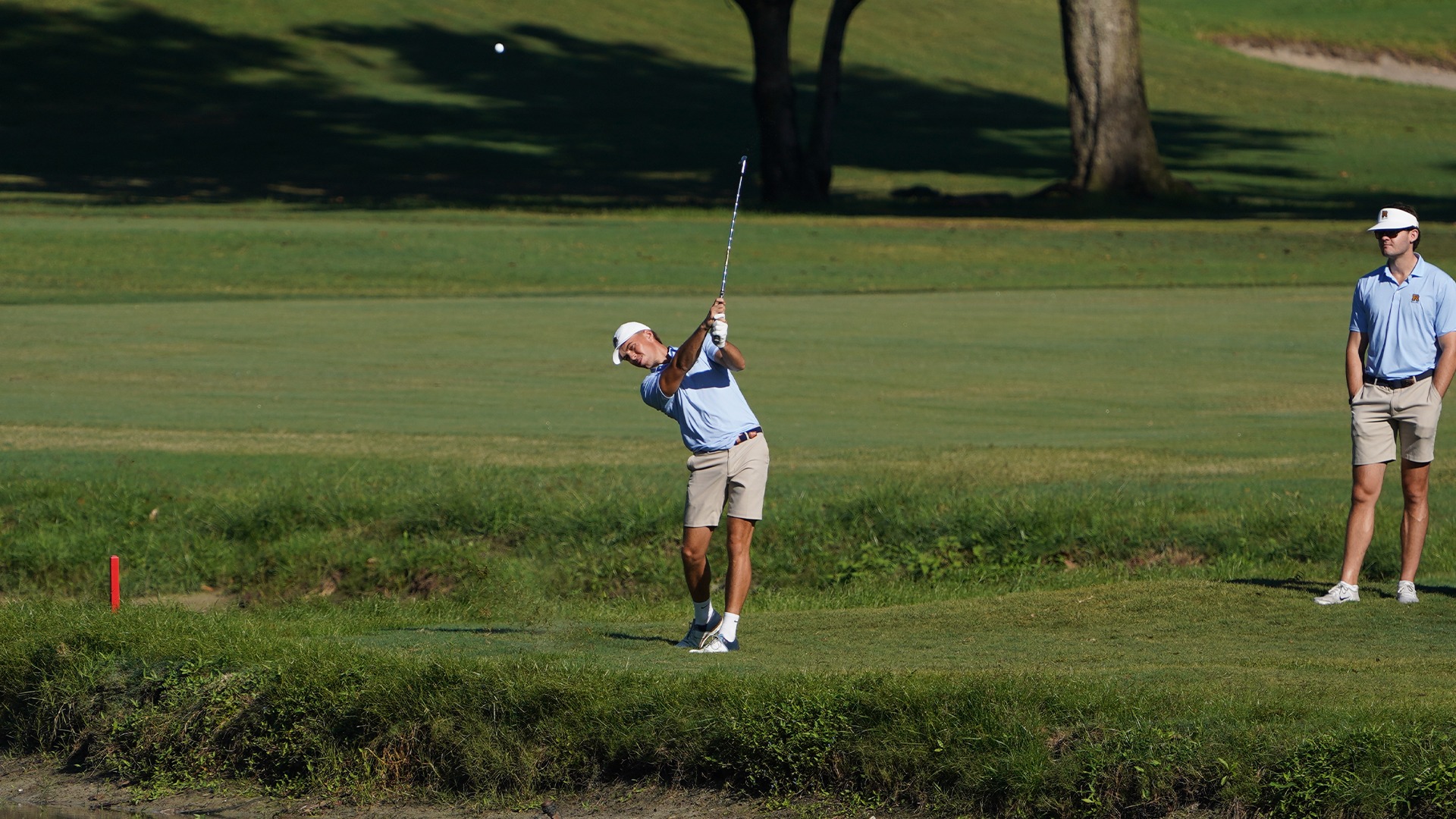 MGOLF Sean Dobson iron shot over water