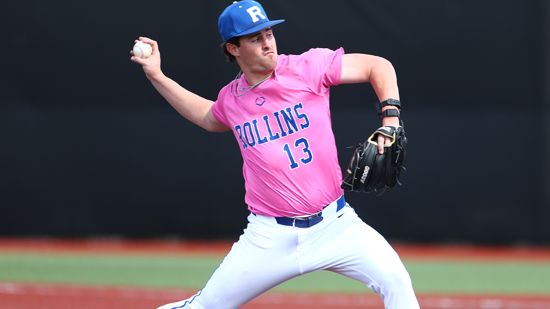 BASE Brett DEnnis pitching pink uni