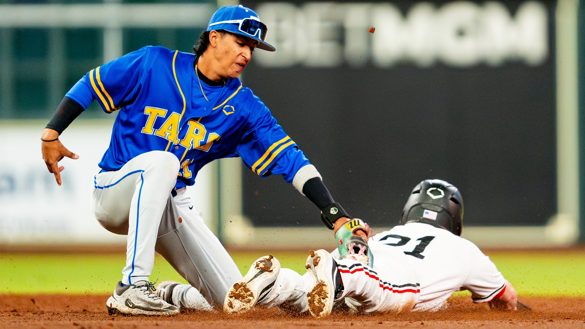 BASE Mauri Bejarano tagging a runner