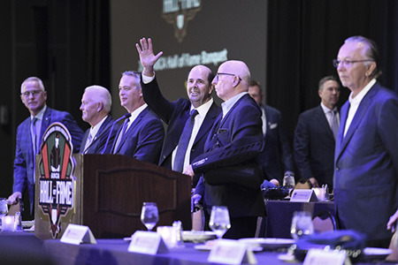Jim Wells at the podium at the Hall of Fame induction