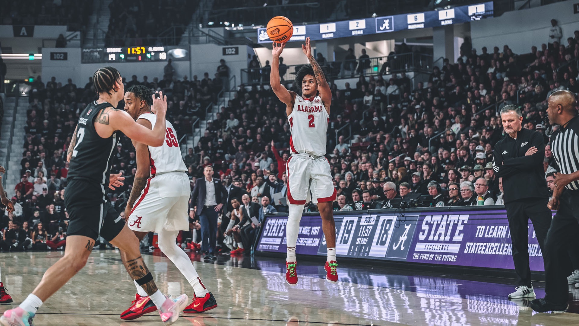 Aden Holloway shoots a jumper at Mississippi State