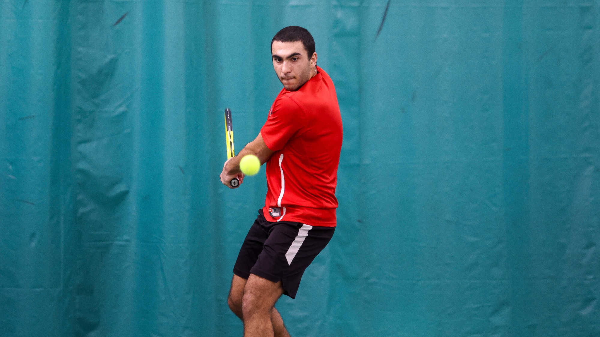 Aiden Atri of the 2025-26 RPI Men's Tennis roster in action versus Middlebury on Saturday, February 28, 2026 in Latham, New York.