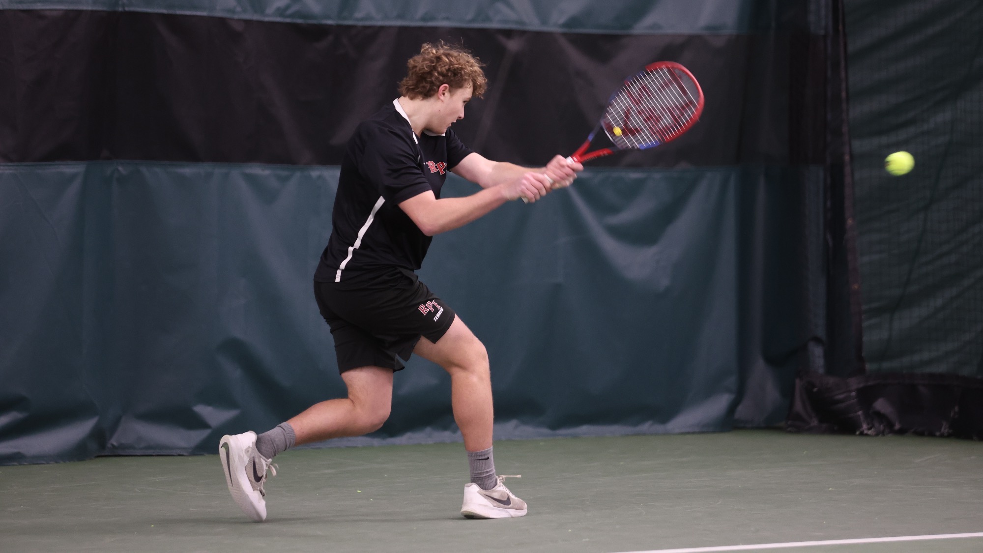Felix Puyplat of the 2025-26 RPI Men's Tennis roster in action versus Middlebury on Saturday, February 28, 2026 in Latham, New York.