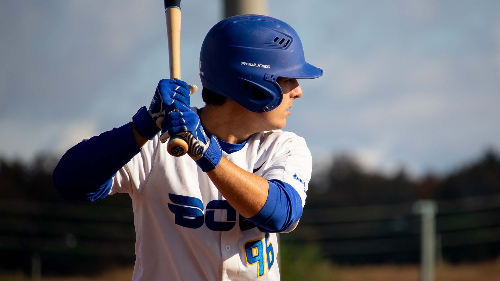 Ben Barzo watches a pitch vs Laurentian Voyageurs as he prepares to swing