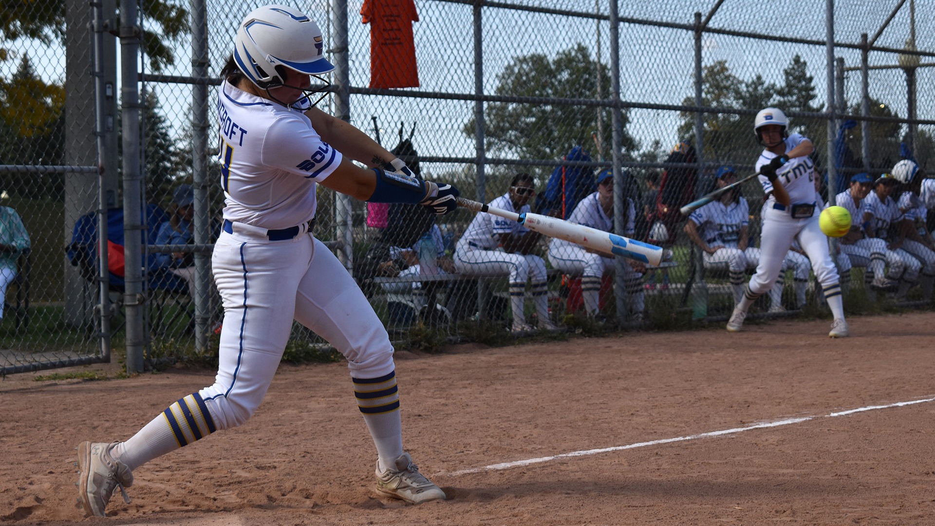 A TMU batter swings at a pitch.