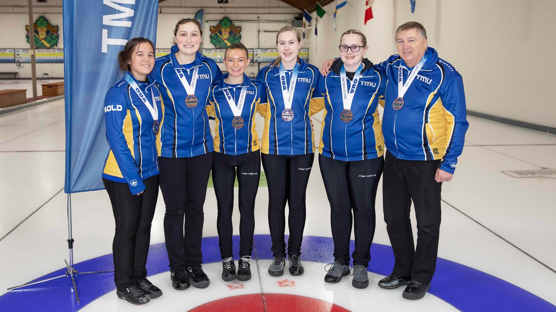 The TMU women's team poses with their OUA bronze medals.