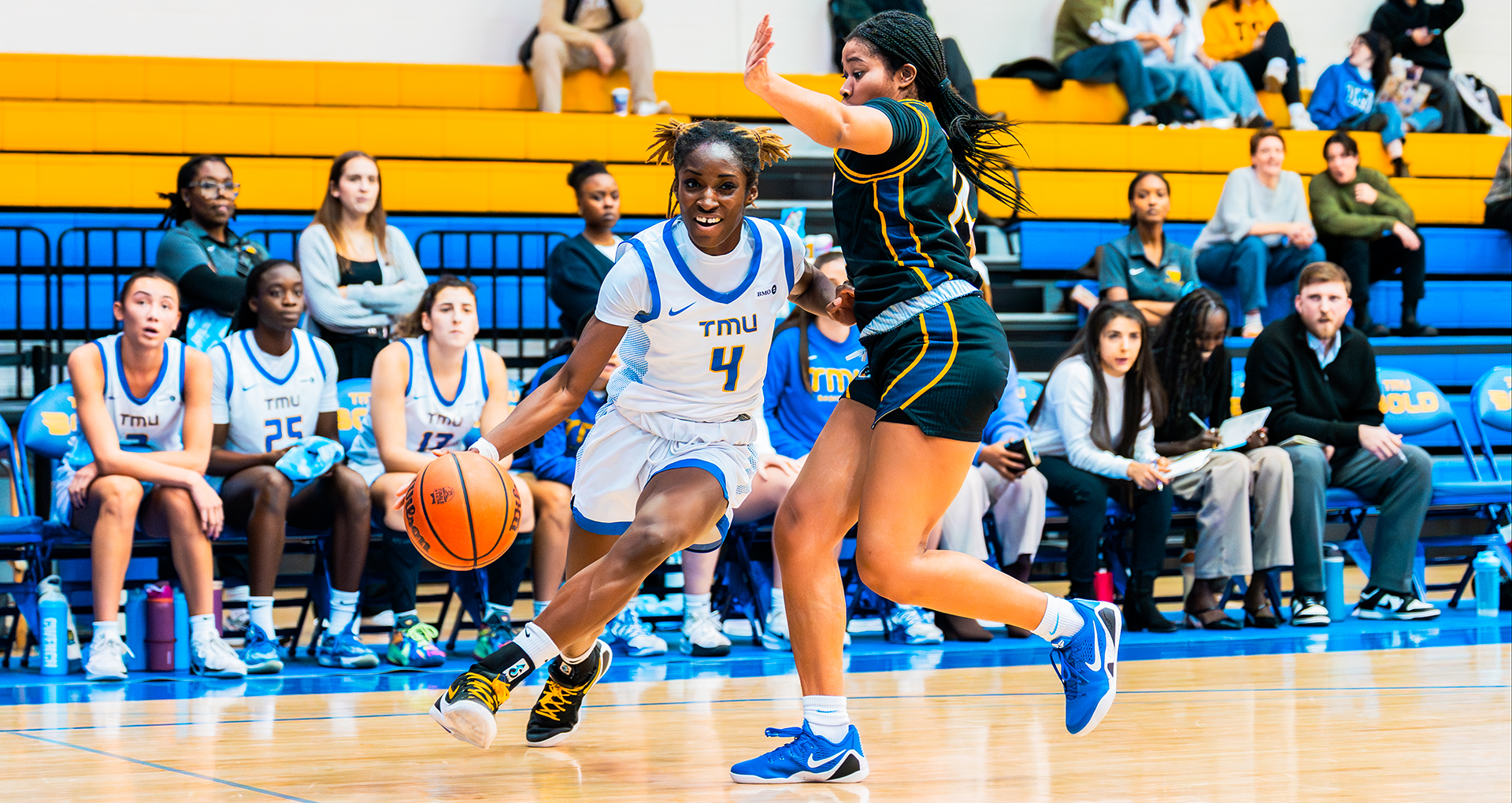 TMU Bold guard Myriam Kone attacks the Laurentian Voyageurs defence. 