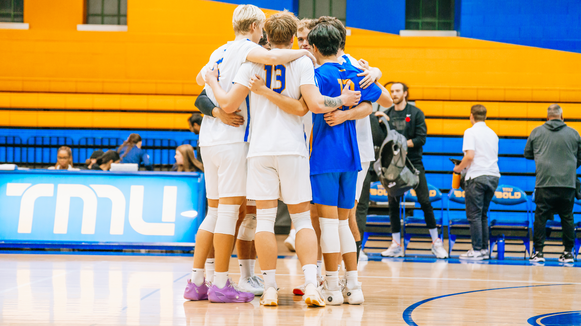 Bold players celebrate after winning a point