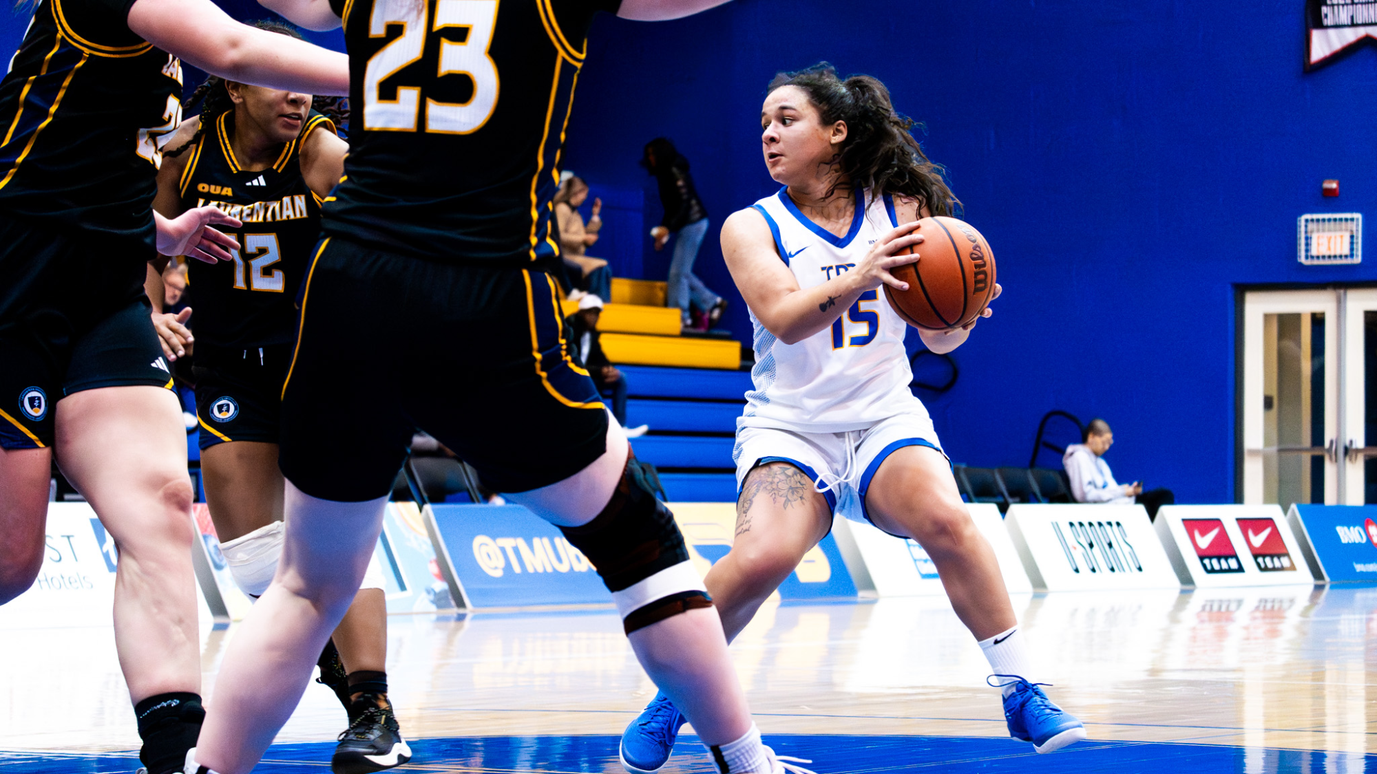 Kait Nichols looks to make a pass