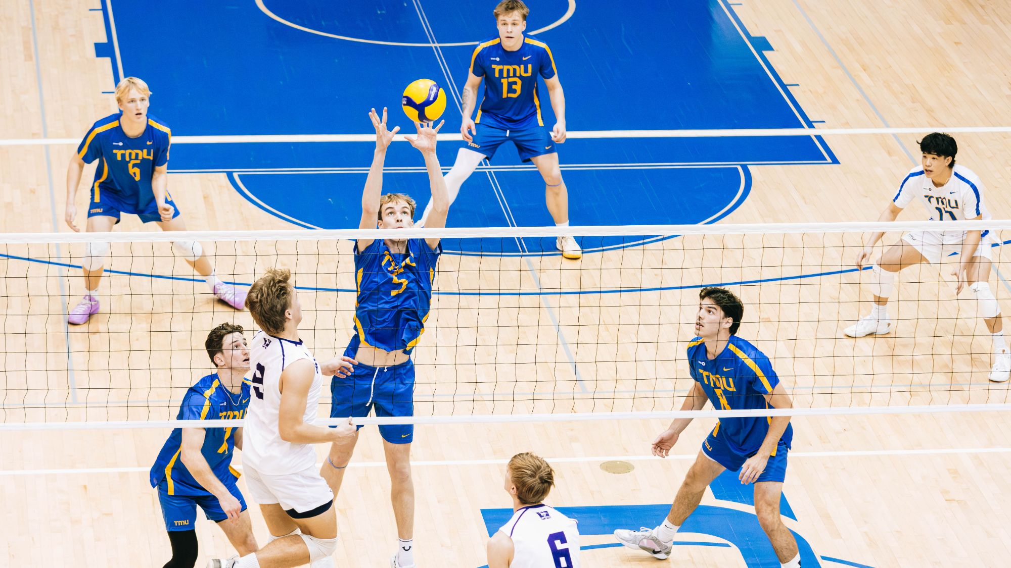 Aidan Suttie goes up for a block against Western