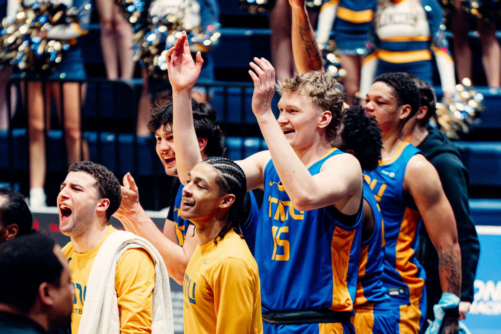 TMU Bold MBB bench celebrating against Windsor 