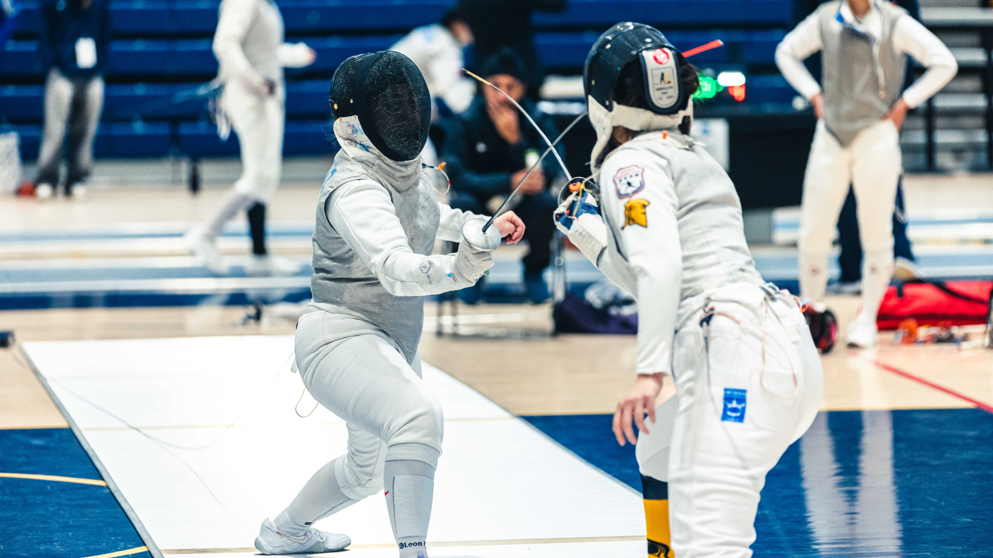 Erika Dominguez competes in a fencing competition