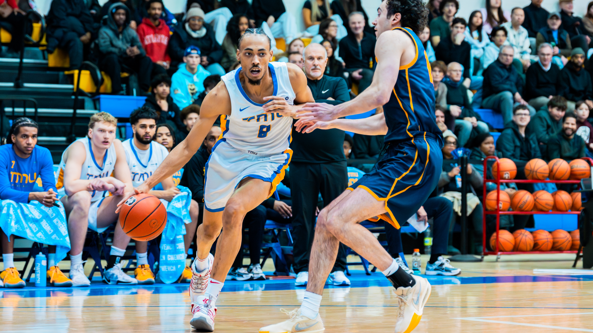 Bold Guard/Forward DeAndre Goulbourne Attacks a Gaels Defender