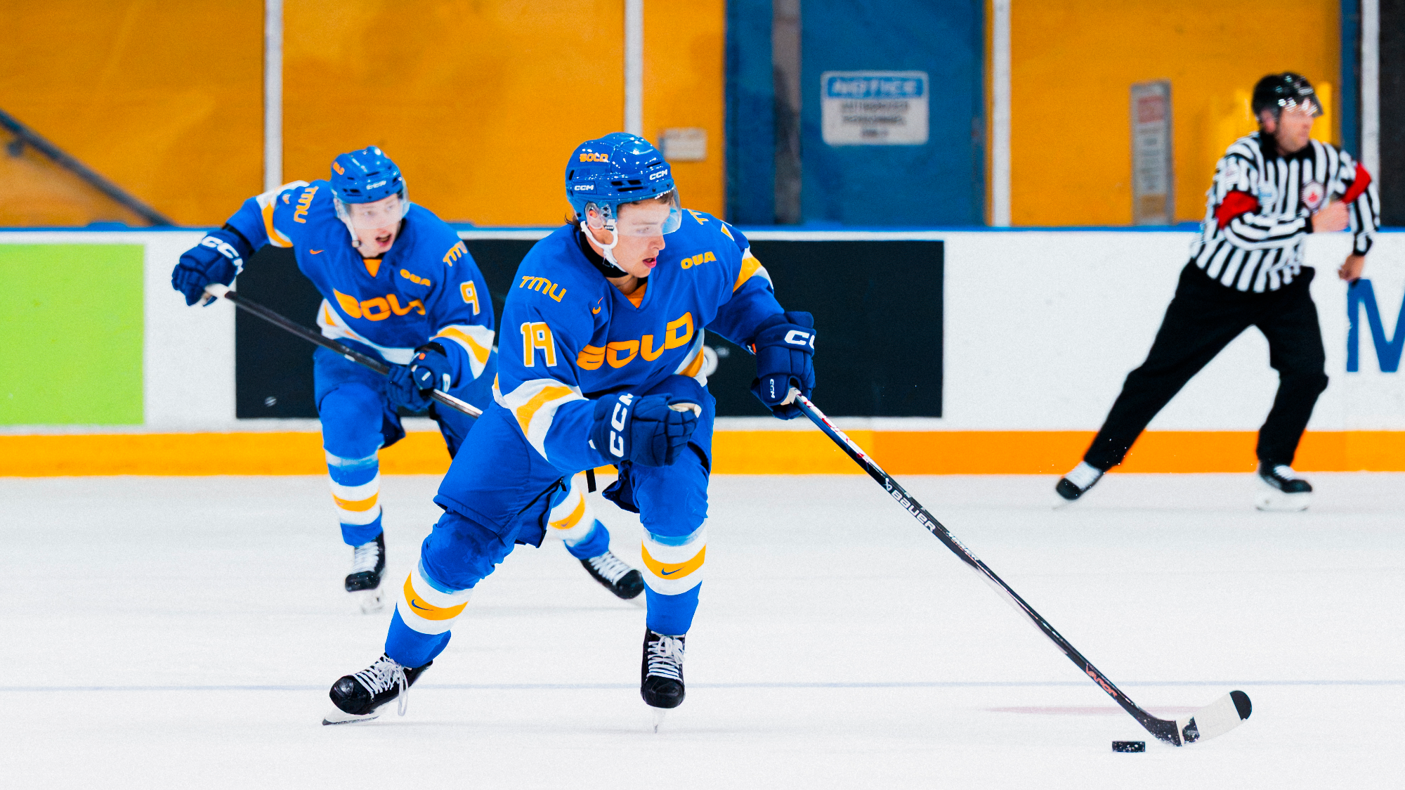 Jack Rimmer skating with the puck