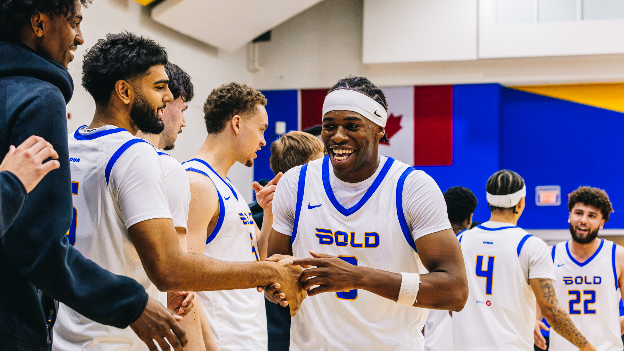 Bold recruit Tobe Ezeokafor smiles as he celebraates with his teammates
