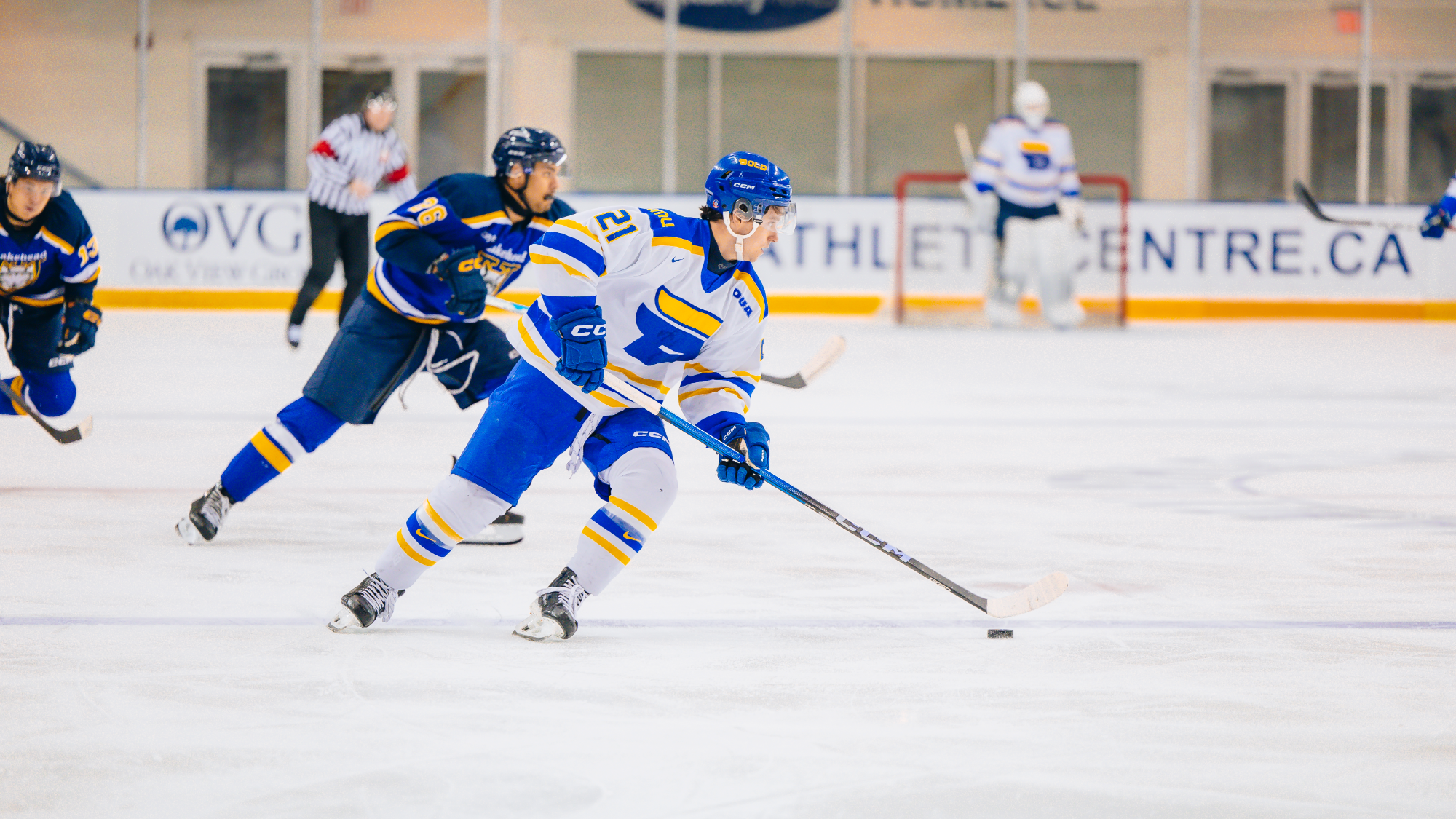 Adam O'Marra driving the puck to the net