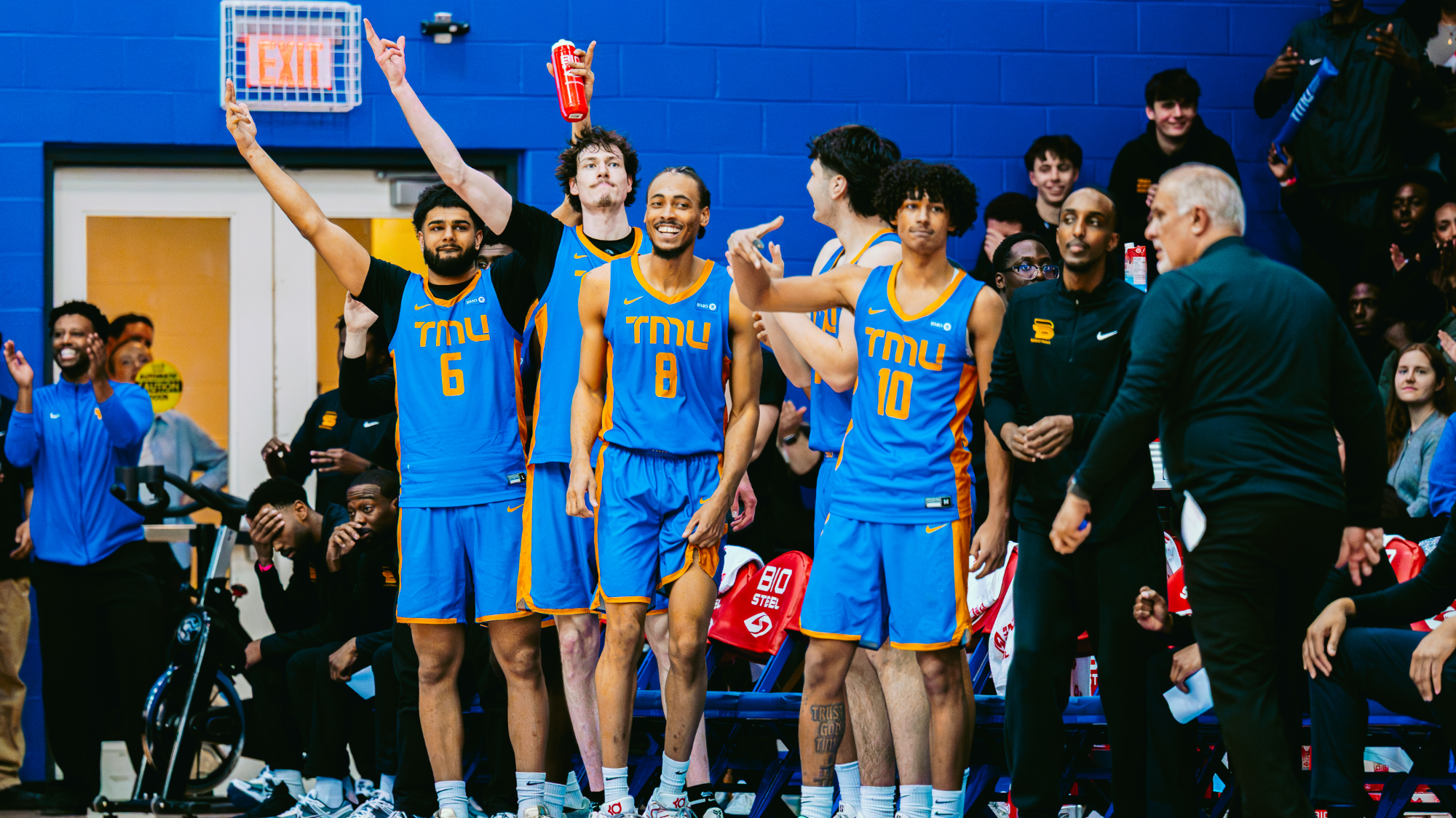 Bold players celebrate on the bench
