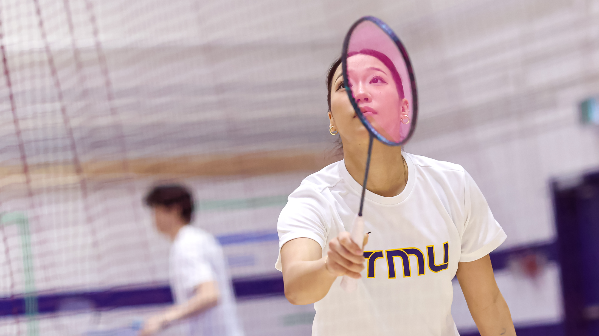 Audrey Chen plays badminton
