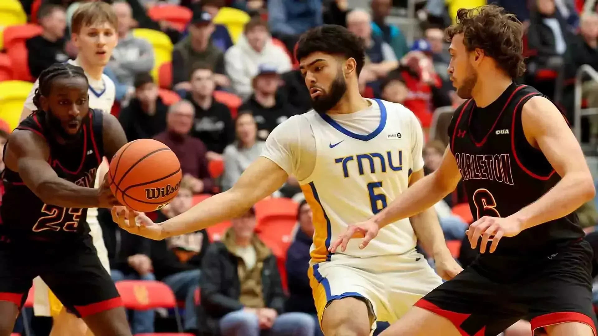 Gurdeep Kalsi reaches for a loose ball against the Carleton Raven