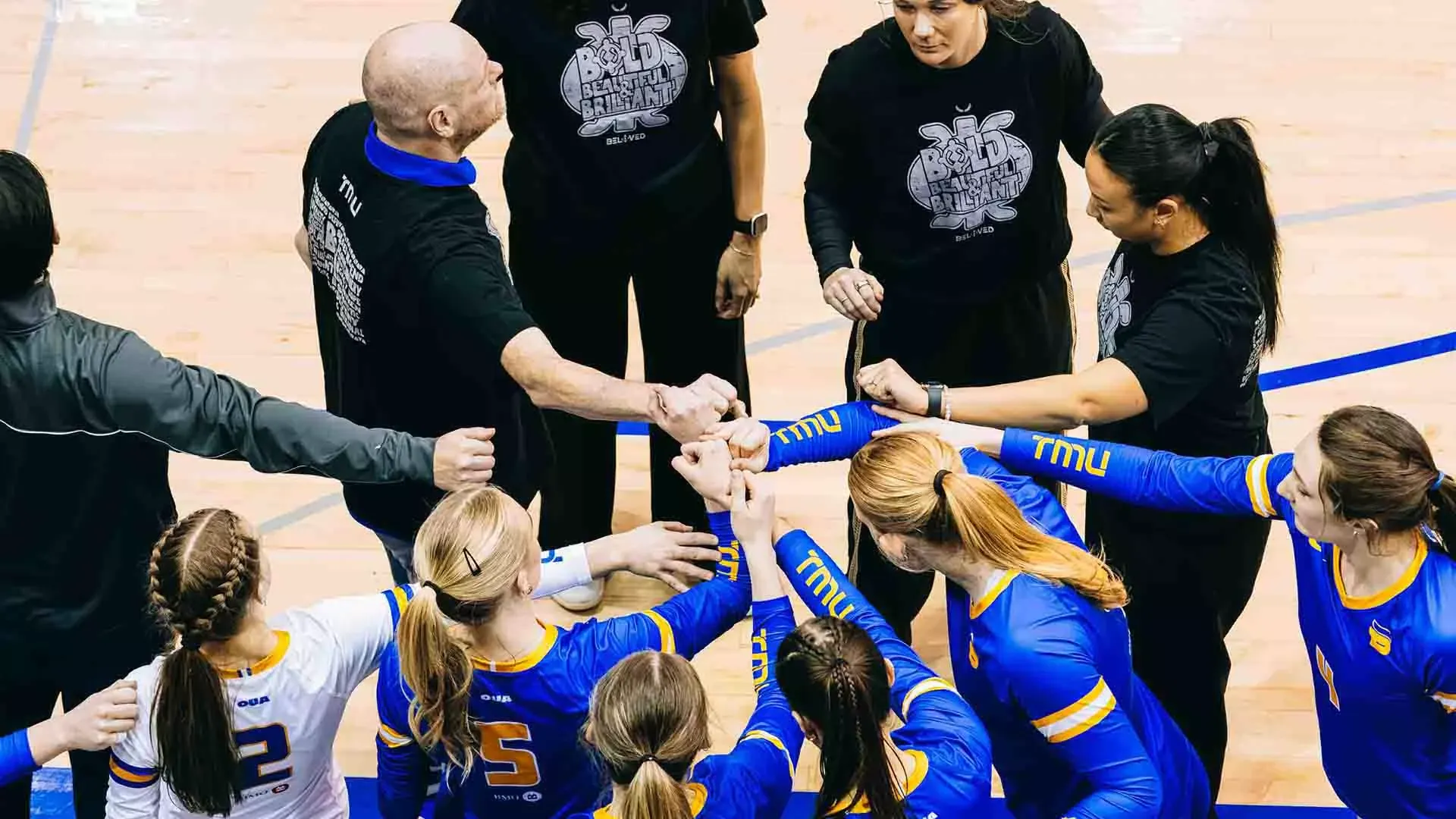 The Bold huddle during a time out against RMC
