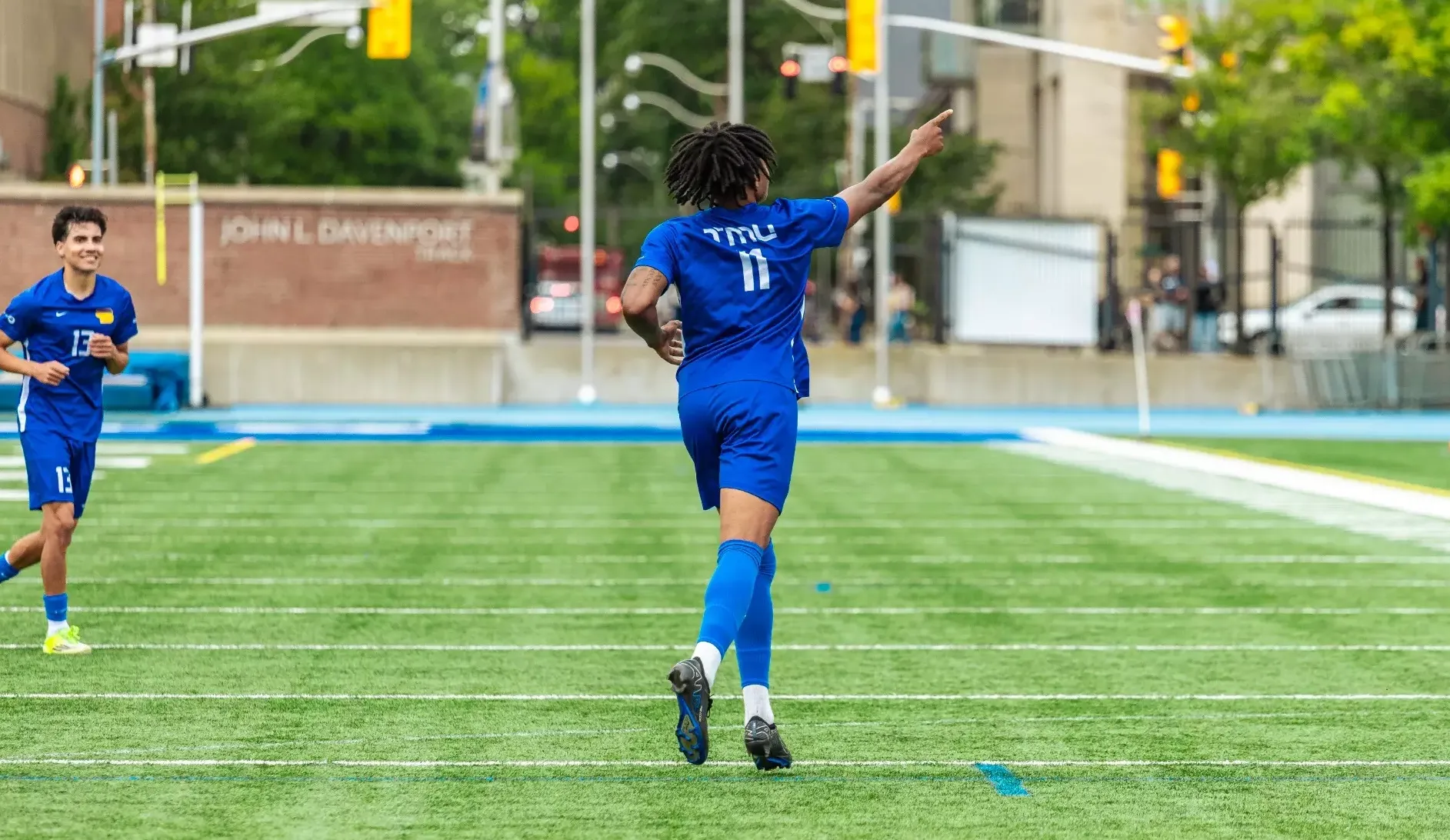 Bold Midfielder Darius Kerr-Cooper Points at the Crowd After Impressive Goal