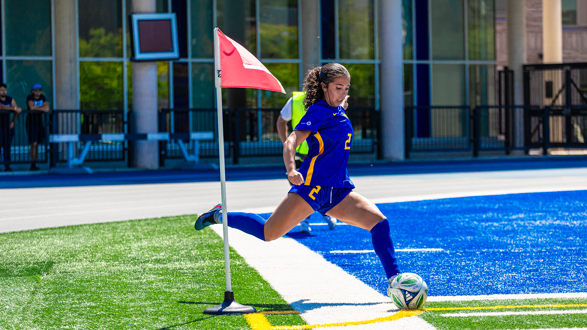 Gloria Lucas takes a corner kick for the TMU Bold women's soccer team