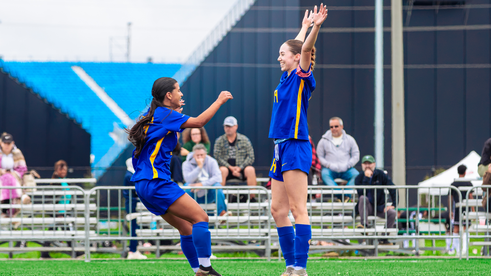 Moynihan and Saleh celebrate a goal
