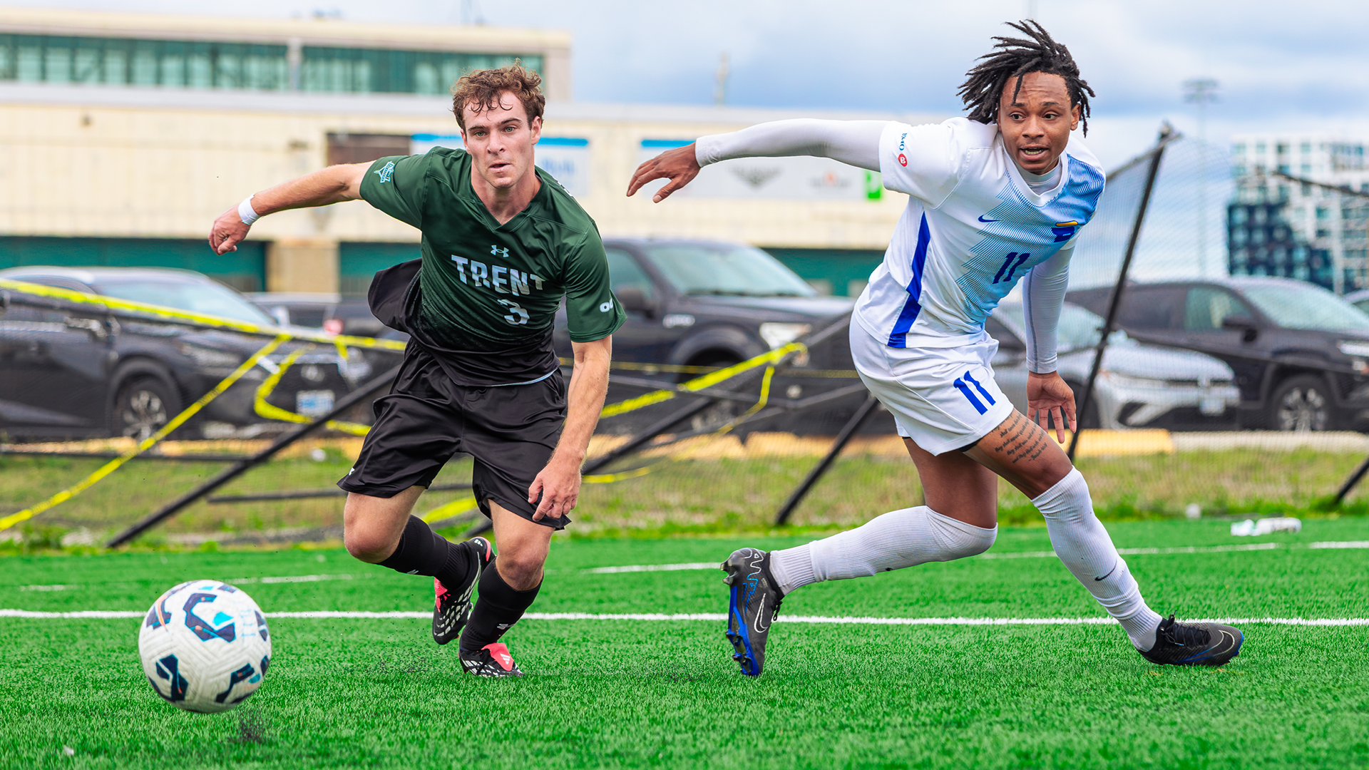 TMU Bold's Darius Kerr-Cooper chases a ball down against the Trent Excalibur