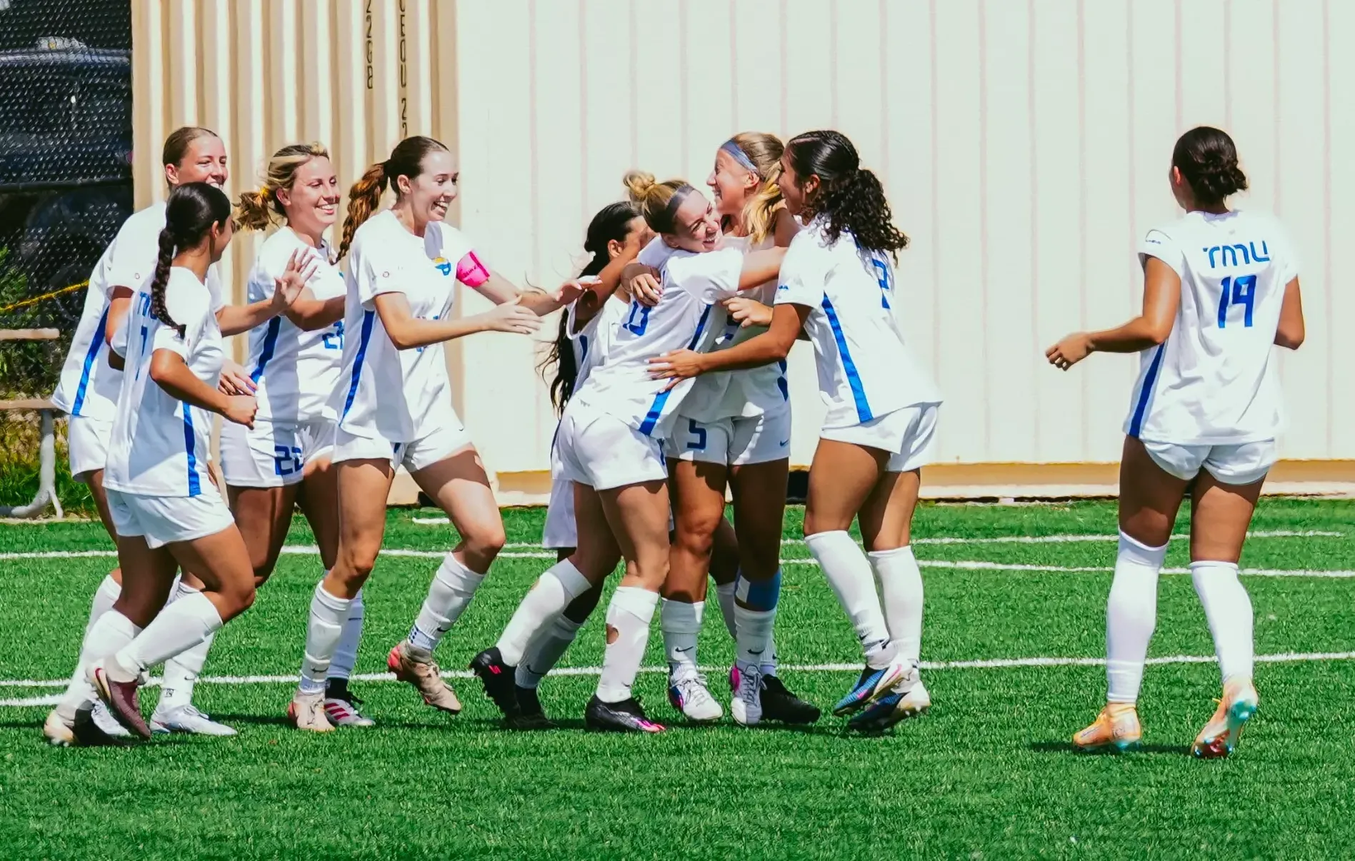 Bold players celebrate after a second-half goal from defender Anna Ciomaciova